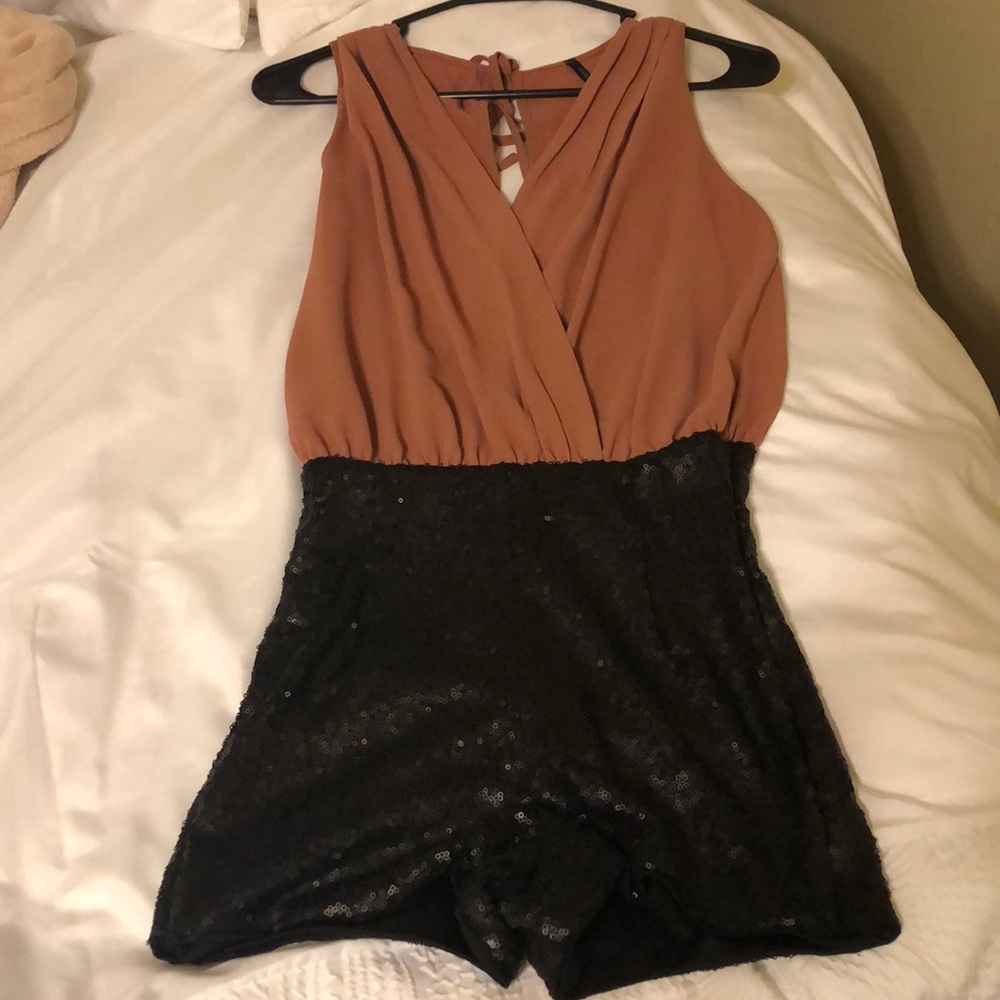 Romper (Top attaches to shiny shorts) Size Small